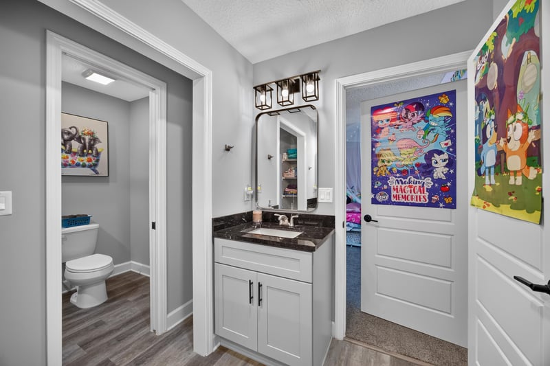 Bathroom with vanity and toilet at 2817 Camel Cir, Middleburg, FL