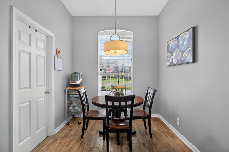 Breakfast nook with round table and window view at 12825 Kelsey Island Dr, Jacksonville, FL 32224