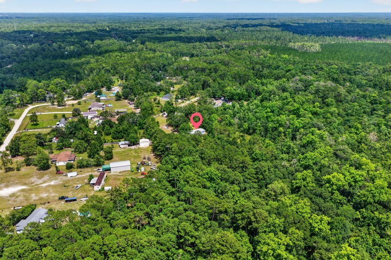 Aerial wide view of wooded rural land in Middleburg, FL
