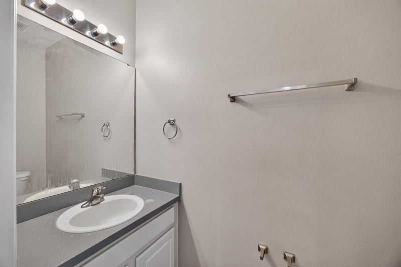 Bathroom with vanity mirror and sink at 1572 Biscayne Bay Dr, Jacksonville, FL 32218