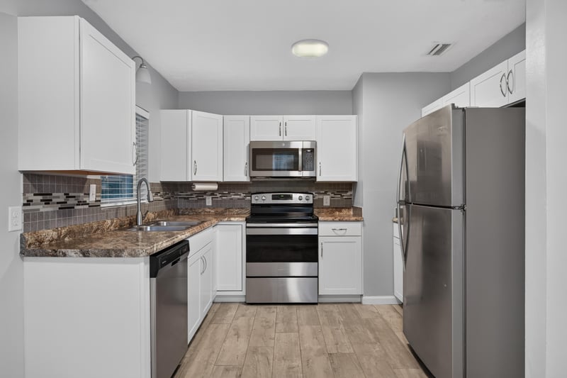 Kitchen, stainless appliances and granite counters at 2256 Inwood Cir S, Jacksonville, FL