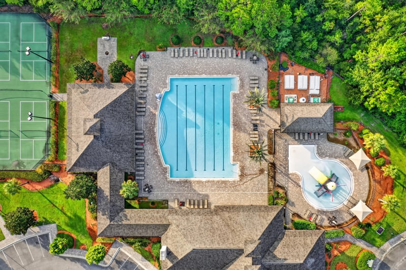 Drone view of community pool complex in River Glen