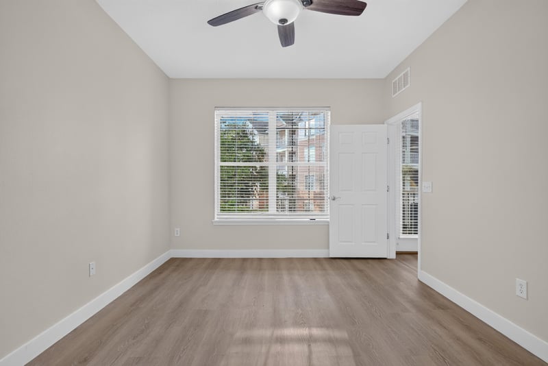 Bedroom with window and ceiling fan at 11251 Campfield Dr unit 1202, Jacksonville, FL 32256