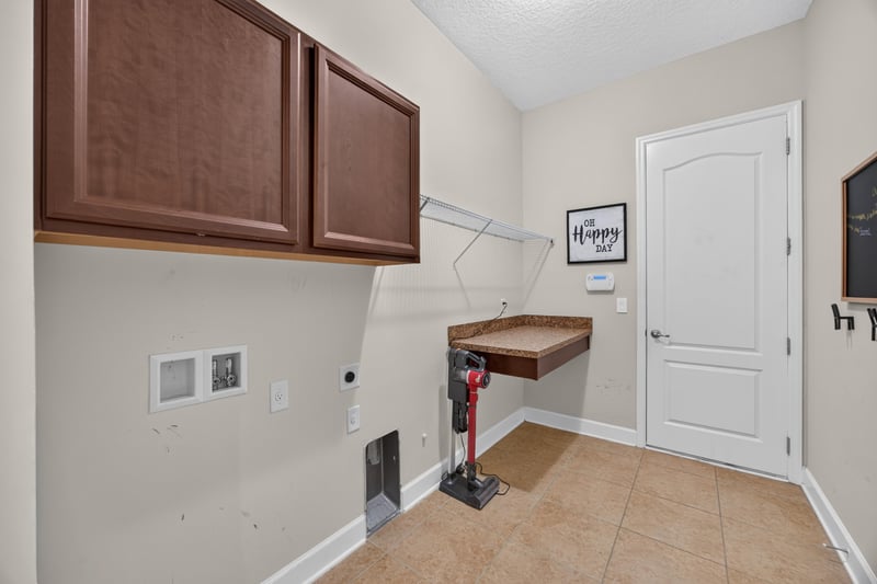 Laundry room with upper cabinets at 276 Cross Ridge Dr, Ponte Vedra Beach, FL 32081