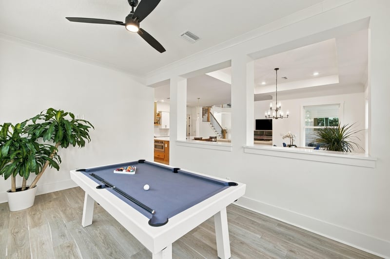 Game room with pool table and pass-through to kitchen at 907 Seagrove Dr, Ponte Vedra Beach, FL 32081
