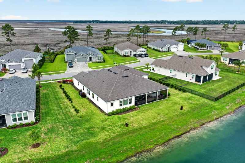 Drone view of the home and neighboring houses in Fernandina Beach, FL