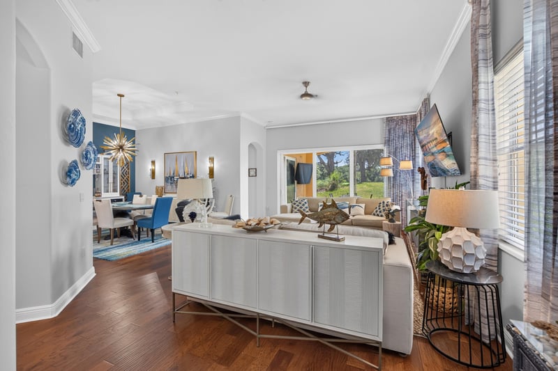 Open living and kitchen area with natural light at 140 Ave De La Mer, Palm Coast, FL 32137
