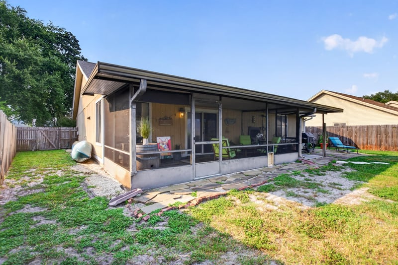 Screened porch exterior view at 13020 Medford Ln, Jacksonville, FL 32225
