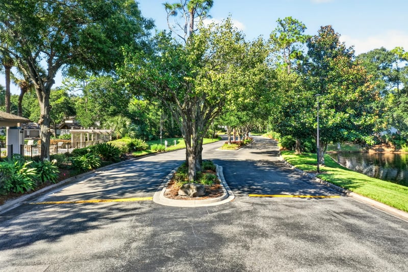Aerial view of tree-lined street in the Lakecrest Condo community