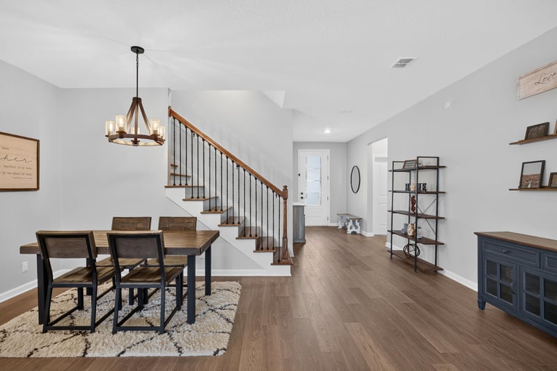 Dining area with staircase and open shelving at 2354 Jennings Farm Dr, Middleburg, FL 32068
