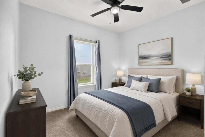 Bedroom with staged bed and window at 2378 Caney Oaks Dr, Jacksonville, FL