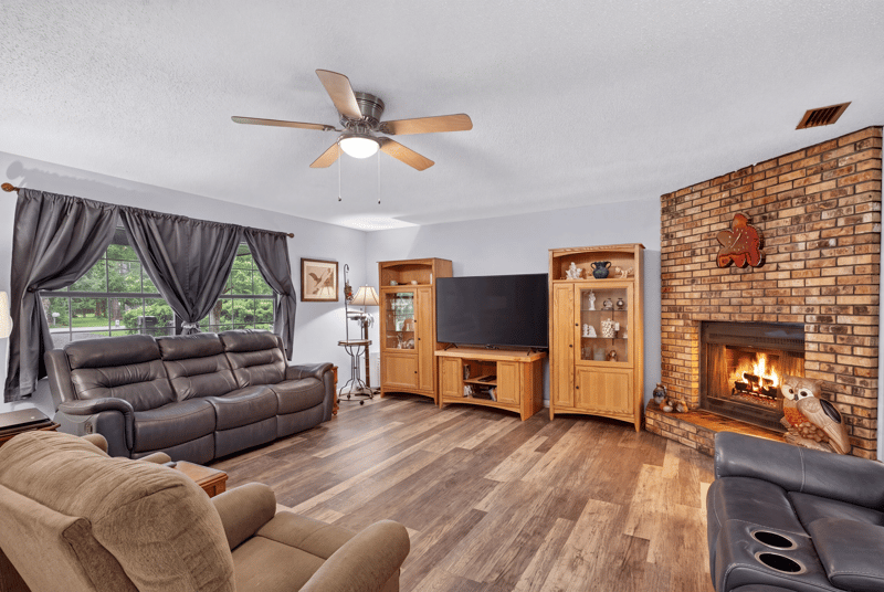 Living room with sectional sofa and ceiling fan at 3249 Maryland Ave, Green Cove Springs, FL