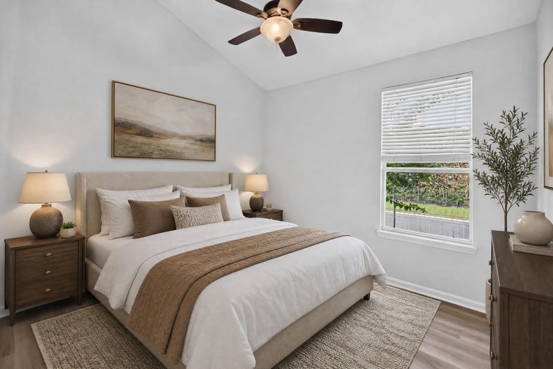 Bedroom virtually staged with bed and nightstand at 3101 E Banister Rd, St. Augustine, FL 32092