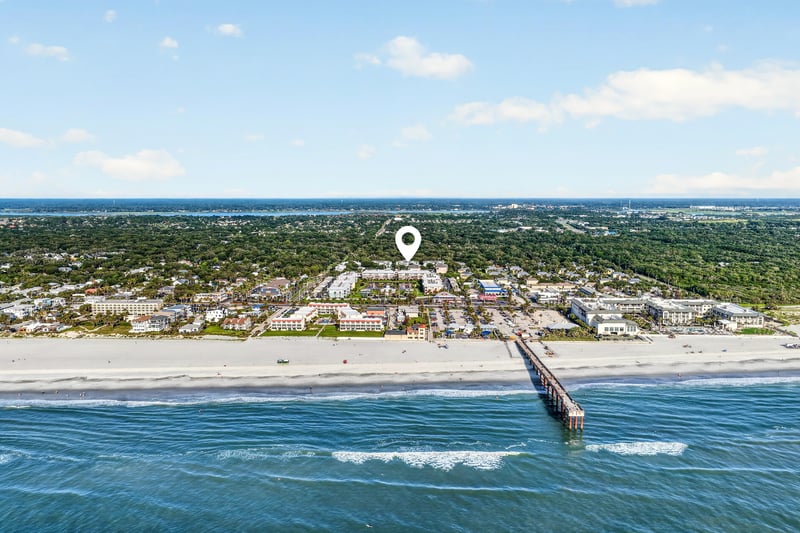 Aerial view of the shoreline and pier in St. Augustine, FL
