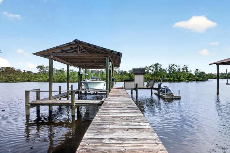 Covered dock on the water at 2125 Blue Heron Cove Dr, Orange Park, FL 32003