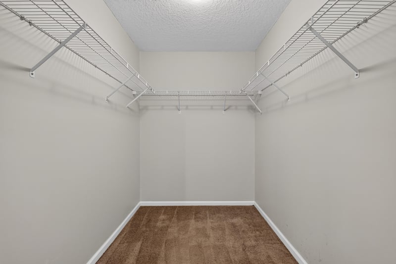 Walk-in closet with wire shelving at 11669 Collins Creek Dr, Jacksonville, FL 32258