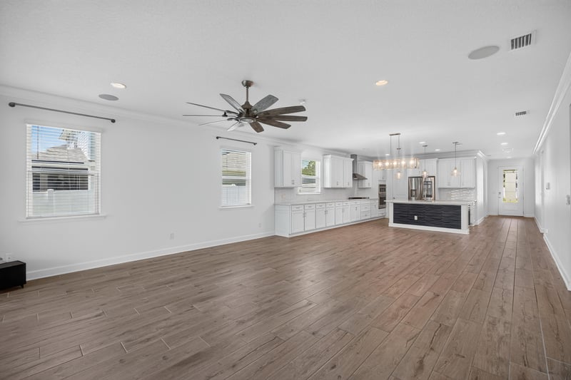 Open living and kitchen space at 855 Flach Dr, St. Johns, FL
