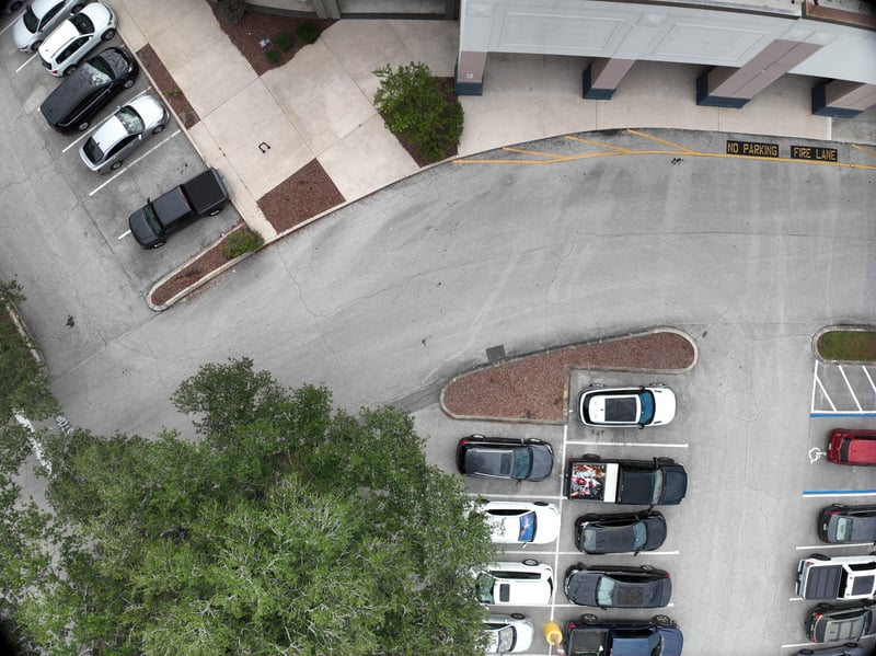 Aerial view of parking lot and curved drive at 9406 Atlantic Blvd, Jacksonville, FL 32225