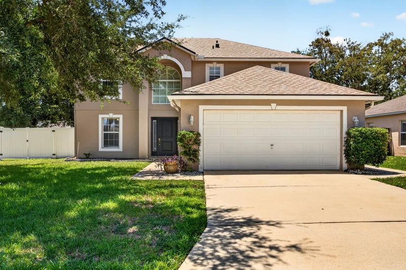 Front exterior with covered entry at 3428 Glenn Hollow Ct, Jacksonville, FL 32226