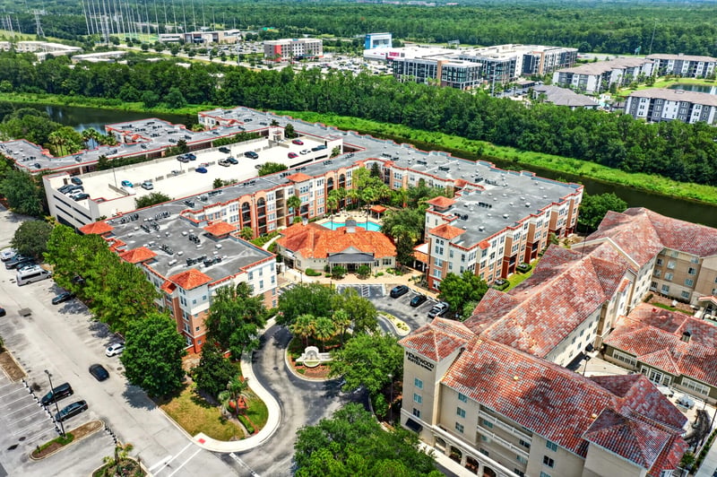 Aerial view of the condo complex and courtyard pool in Jacksonville, FL