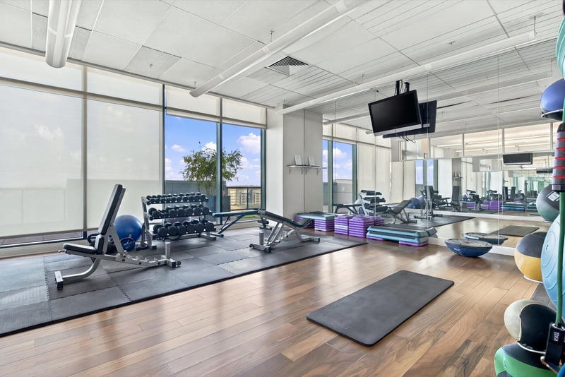 Fitness center equipment and river view, photographed by Megapixeler on Riverplace Blvd, Jacksonville
