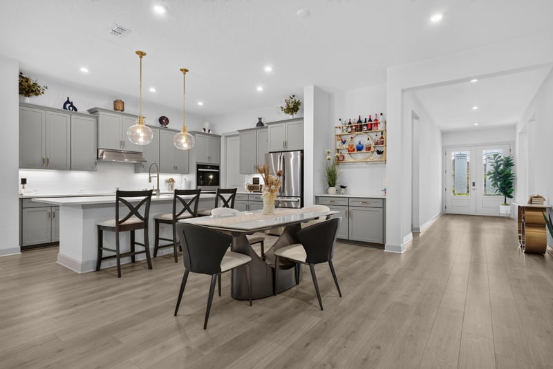 Kitchen island with pendant lighting and bar stools at 785 Back Creek Dr, St. Augustine, FL 32092