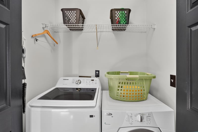 Laundry room with washer and dryer at 6931 Cane Grass Ln E, Jacksonville, FL 32244