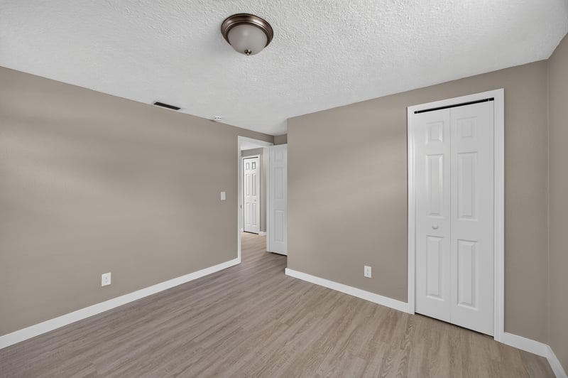 Empty bedroom with closet and hallway view at 184 Draco St, Orange Park, FL 32073