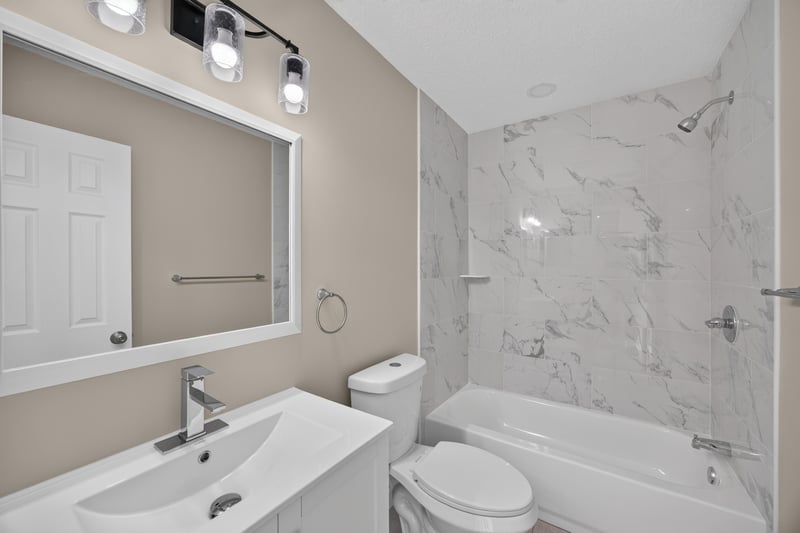 Bathroom vanity next to tub and shower at 4117 Wilcrest Ct, Jacksonville, FL 32277