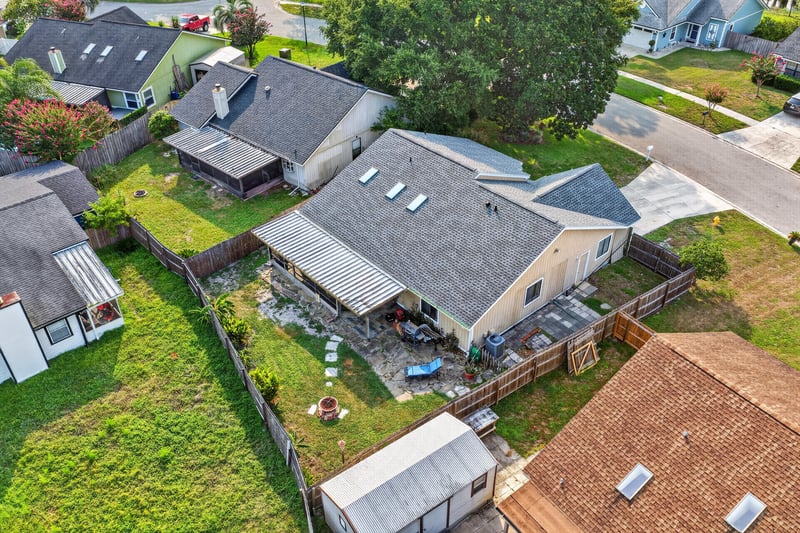 Aerial backyard view with roof at 13020 Medford Ln, Jacksonville, FL 32225