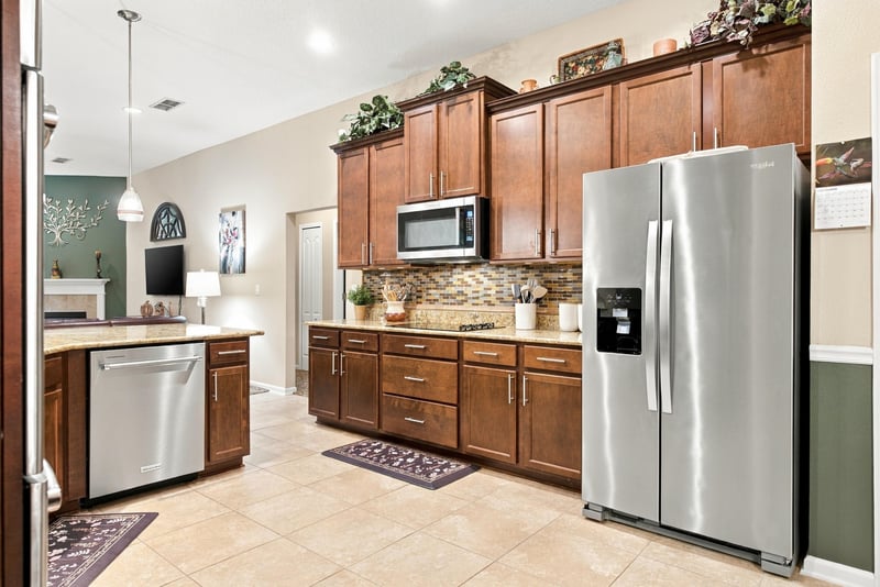 Kitchen with refrigerator and dishwasher at 10923 Black Diamond Ct, Jacksonville, FL