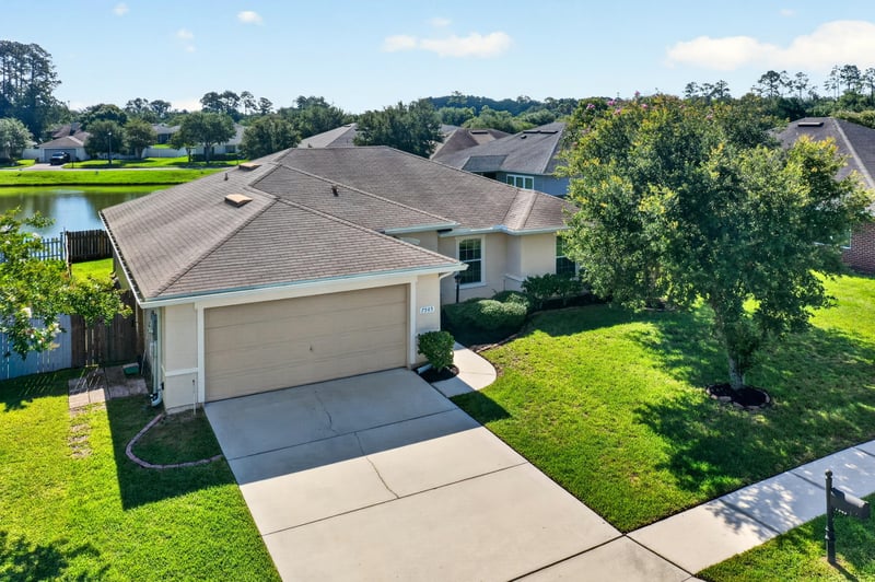 Front exterior and driveway at 7545 Lirope St, Jacksonville, FL 32244