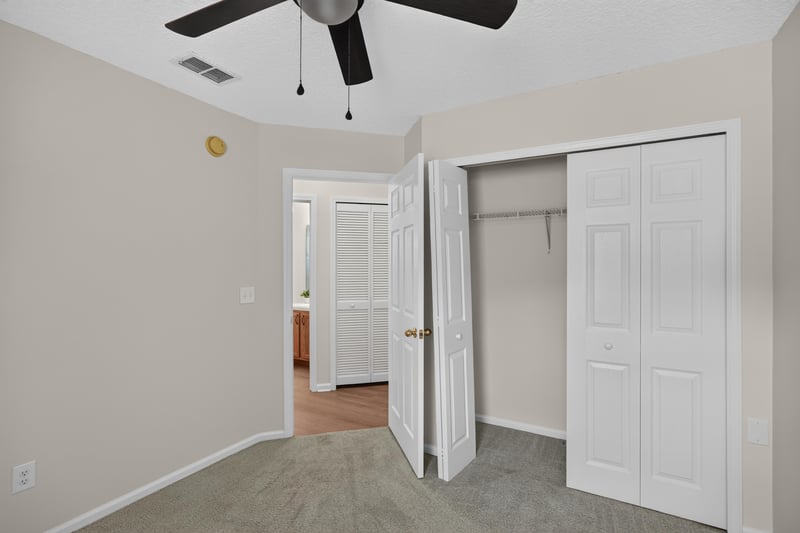 Bedroom with closet near hallway at 605 N Covered Bridge Rd, Jacksonville, FL