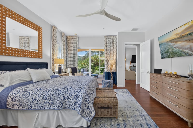 Bedroom with sliding glass door to the lanai at 140 Ave De La Mer, Palm Coast, FL 32137