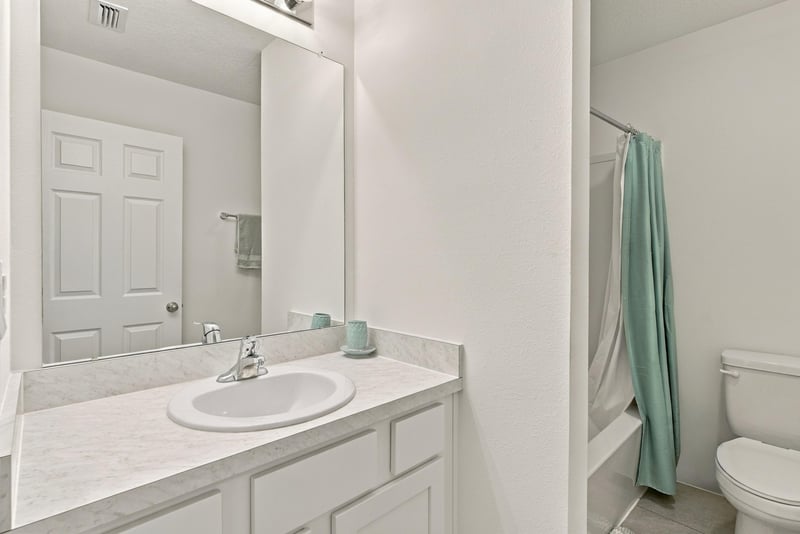 Bathroom with shower and vanity, photographed by Megapixeler on Haymon Ave, Jacksonville