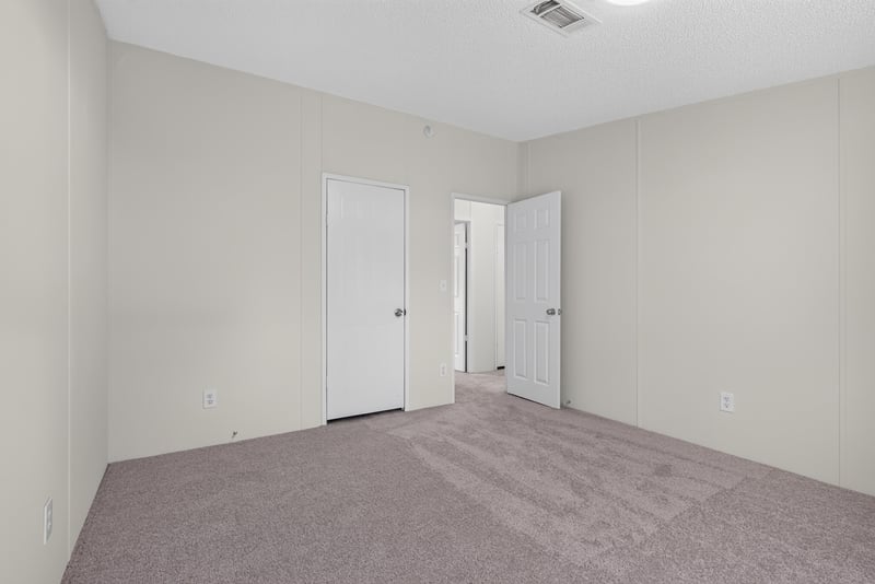 Bedroom with closet, unfurnished at 7603 Coach Park Dr, Jacksonville, FL 32244