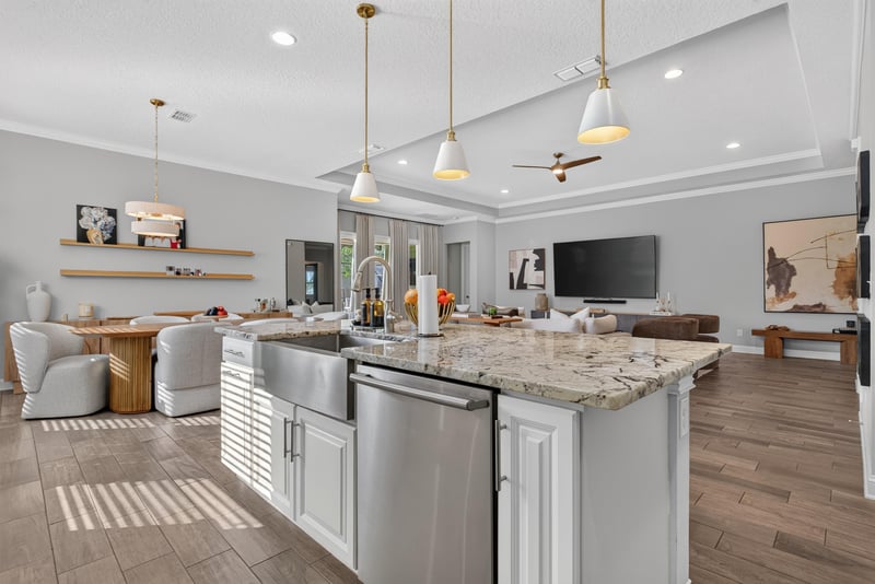 Kitchen island open to the living room at 3328 Southern Oaks Dr, Green Cove Springs, FL 32043