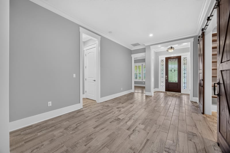 Hallway with wood floors and white trim at 186 Freshwater Dr