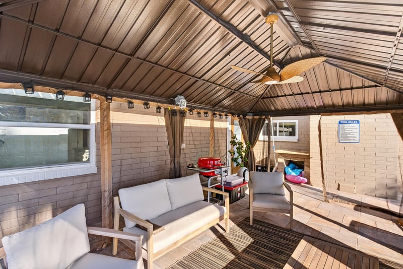 Covered patio seating area at 1525 8th St N, Jacksonville Beach, FL