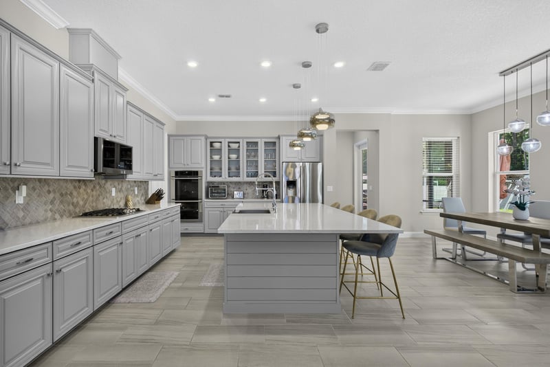 Kitchen island with pendant lighting at 22 Azura Point