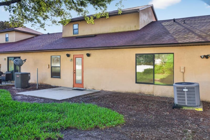 Rear exterior with patio and landscaping at 353 Redwood Ln