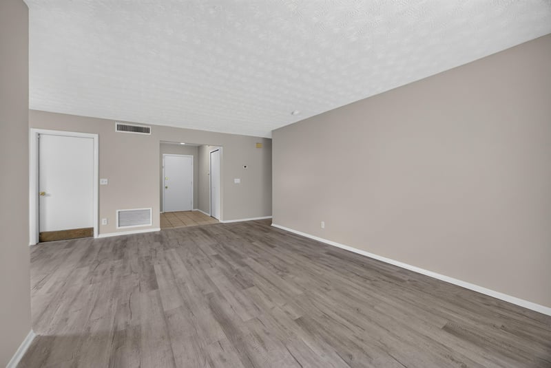 Empty room with closet and wood-look flooring at 1083 Stokes St, Jacksonville, FL