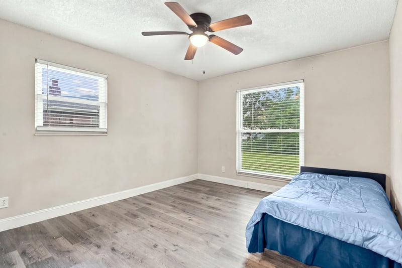 Bedroom with two mattresses and window at 357 Dillon Dr, Orange Park, FL