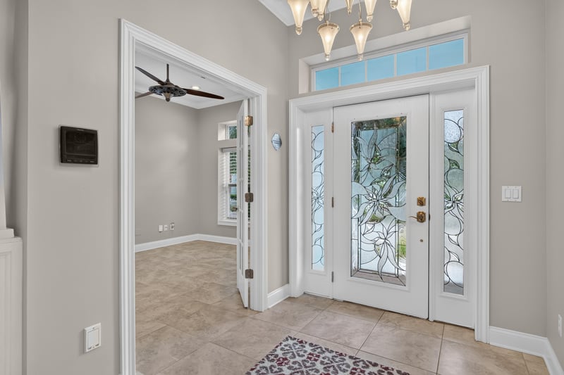 Foyer with glass front door at 117 Island Cottage Way, St. Augustine, FL 32080