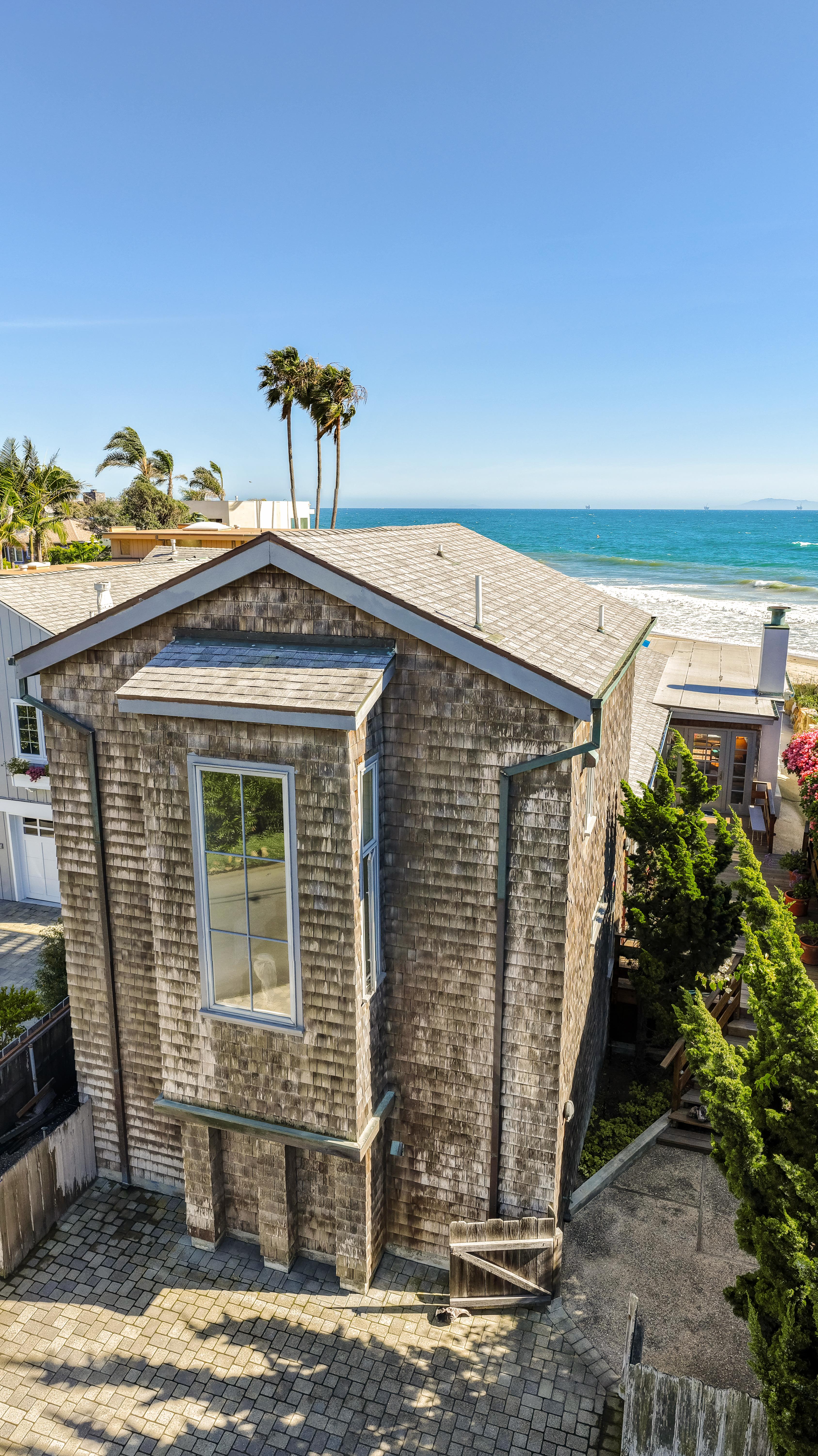 Real estate drone photography of 3581 Padaro Ln, Carpinteria CA — aerial view of Carpinteria bluffs and Channel Islands coastline by VirTour Media