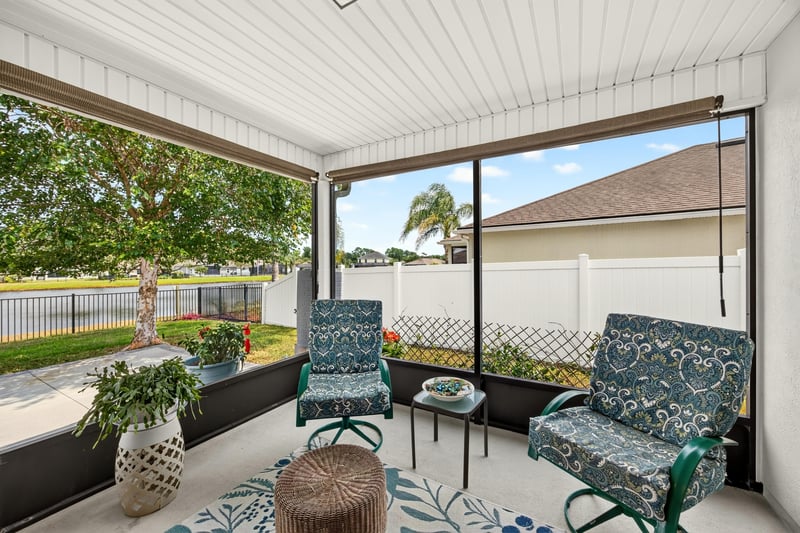 Screened lanai with patio furniture at 85 Amia Dr, St. Augustine, FL 32086