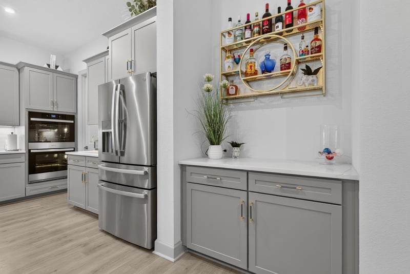 Kitchen with double wall ovens and bar cart at 785 Back Creek Dr, St. Augustine, FL 32092