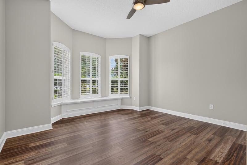 Bedroom with bay window and wood floor at 4109 Eagle Landing Pkwy, Orange Park, FL 32065