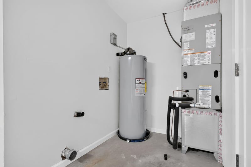 Utility closet with water heater at 8453 Boysenberry Ln W, Jacksonville, FL