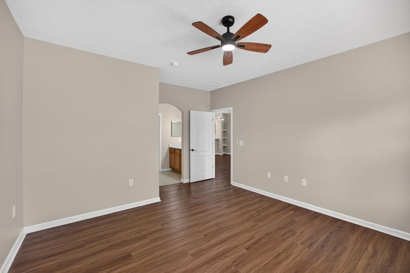 Bedroom with doorway to hall at 3750 Silver Bluff Blvd, Orange Park, FL